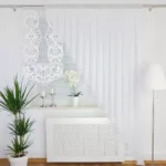 Elegancki zestaw firany oraz panelu ażurowego