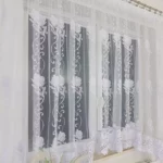 Firana z pięknej markizety oraz gipiury i cyrkonii uszyta w łuk