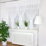 Firana z haftem zdobiona uroczymi kokardami-biała 300x150cm