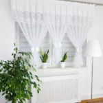 Firana z haftem zdobiona uroczymi kokardami-biała 300x150cm