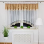 Firana gotowa 400x160 cm z brązowymi kokardkami i haftem