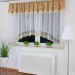 Firana gotowa 400x160 cm z brązowymi kokardkami i haftem