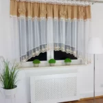 Firana gotowa 400x160 cm z brązowymi kokardkami i haftem