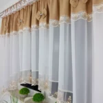 Firana gotowa 400x160 cm z brązowymi kokardkami i haftem